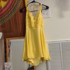 Backless yellow bebe dress